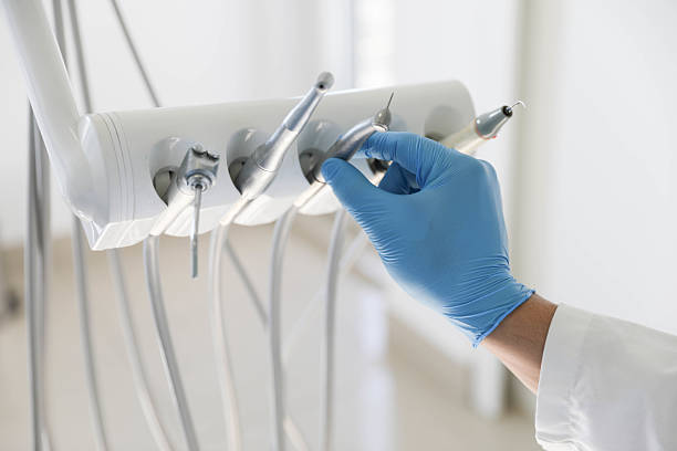 Professional Tooth Extraction technician working in Midway North, TX